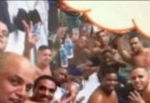 Criminosos tiram foto dentro de cadeia fazendo símbolo de facção