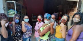 Mulheres criam mercadinho solidário para ajudar moradores de bairro do RJ