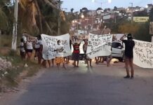 Moradores de comunidade fecham acesso a ponte e linha férrea em protesto após menino de 13 anos ser baleado em Natal